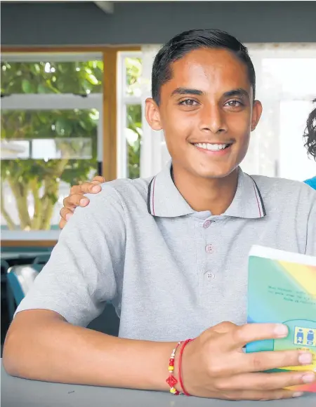  ?? Picture / Doug Sherring ?? Papatoetoe High School’s Hindi teacher Aneeta Bidesi, with students Prateek Kumar, 14, and Anisha Devi, 13, who wants to teach the language to her younger sister who was born in New Zealand.