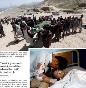  ??  ?? People carry the body of one of the victims of the suicide attack during a burial ceremony, in Kabul. — Reuters photo A man cries beside an injured girl at a hospital after a suicide attack in Kabul. — Reuters photo