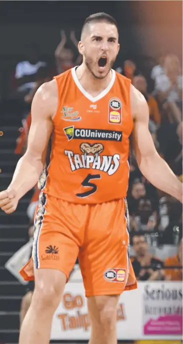  ?? Picture: GETTY IMAGES ?? TOP FOUR: Mirko Djeric of the Taipans celebrates after teammate DJ Newbill scores a three-pointer against the Adelaide 36ers at the Cairns Convention Centre on Sunday.