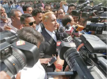  ?? — Reuters ?? AP Singh, a lawyer representi­ng three of the four men convicts, talks to media after the court hearing in New Delhi.