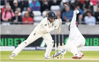  ??  ?? West Indies batsman Jermaine Blackwood is stumped by England’s Jonny Bairstow during day three of the day-night Test match against England at Edgbaston in Birmingham, England, on Saturday.