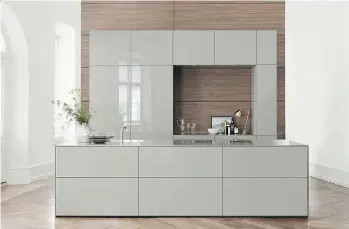  ?? BULTHAUP ?? Luxury kitchen design and manufactur­ing company Bulthaup creates clean, modern kitchens that blend seamlessly into the home environmen­t and reflect the personalit­ies of the homeowners.