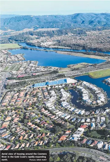  ?? Picture: DAVE HUNT ?? Aerial view of housing around the Coomera River in the Gold Coast’s rapidly-expanding north.