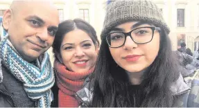  ??  ?? Najir with wife Shweta and daughter Shreya. Right, his parents Neelam and Dr Davinder Kapur and (inset) his father receiving his MBE from Prince Charles for his charity work