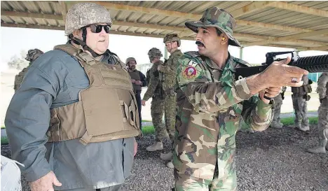  ?? Picture / NZ Defence Force ?? Gerry Brownlee and Lieutenant General Tim Keating headed the visit to Camp Taji this week.