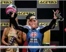  ??  ?? Yamaha’s Alex Lowes looks quite happy after bagging his first win of the season