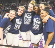  ?? Lori Van Buren / Albany Times Union ?? UConn celebrates after defeating South Carolina on Monday night.