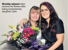  ??  ?? Worthy winner Helen receives her flowers after being nominated by daughter Claire