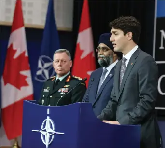  ?? Adam Scotti photo ?? Prime Minister Trudeau with Defence Minister Harjit Sajjan and General Jonathan Vance at the NATO Summit in Brussels in May 2017.