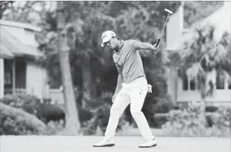  ?? JARED C. TILTON
GETTY IMAGES ?? Satoshi Kodaira of Japan reacts after making his birdie putt on the third playoff hole on Sunday.