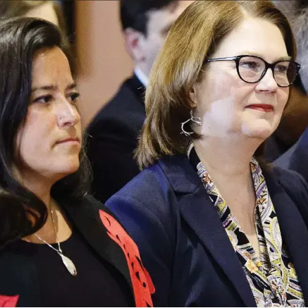  ?? SEAN KILPATRICK /THE CANADIAN PRESS ?? Liberal MPS Jody Wilson-raybould, left, and Jane Philpott take part in a cabinet shuffle at Rideau Hall on Jan. 14.