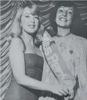  ??  ?? ■ The front page picture on Saturday, October 30, 1976 showed Yvonee Mahaffey (left) handing over a sash to Jo Ferrar, her successor as the new Miss Perkins. The contest was held at Perkins’ social club in Church Walk.