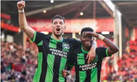  ?? Photograph: Robbie Jay Barratt/AMA/Getty Images ?? Simon Adingra (right) celebrates making it 5-0 at Bramall Lane for Brighton.