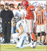  ?? (File Photo/NWA Democrat-Gazette) ?? Fort Smith Northside linebacker Julius Thomas stands over a Fort Smith Southside player after making a tackle in the season-opening game.