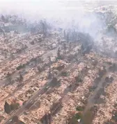  ?? HIGHWAY PATROL VIA EPA-EFE ?? Flames consumed almost everything in their path, including this neighborho­od in Santa Rosa.