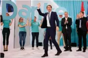  ?? —AFP ?? Leader of Austria’s centre-right People's Party Sebastian Kurz waves to supporters during the party’s election event in Vienna on Sunday.