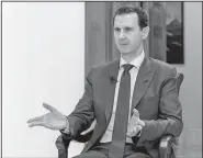 ?? AP/SANA ?? Syrian President Bashar Assad speaks Sunday during an interview with the Daily Mail, in Damascus, Syria.
