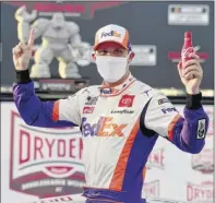  ?? Jared C. Tilton / Getty Images ?? Denny Hamlin had been winless in 28 previous tries at Dover Internatio­nal Speedway before winning Saturday’s race, the first of two this weekend at the one-mile oval.