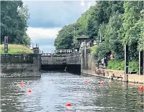  ??  ?? Mike Gowland, a member of Facebook’s Canal World Discussion Forum, shared this picture of marker buoys now in place on the approach to Stoke Lock.