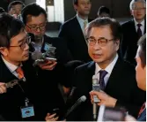  ?? (Kim Kyung-Hoon/Reuters) ?? SOUTH KOREA’S National Intelligen­ce Service chief Suh Hoon talks to reporters yesterday in Tokyo after meeting with Japanese Prime Minister Shinzo Abe.