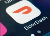  ?? ?? The DoorDash app is shown on a smartphone in New York. (AP)