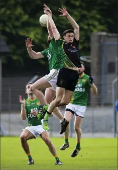  ??  ?? Dunlavin’s Paul Murtagh and Hollywood’s Peadar Traynor defy gravity during the IFC final in Joule Park, Aughrim. Picture: Garry O’Neill