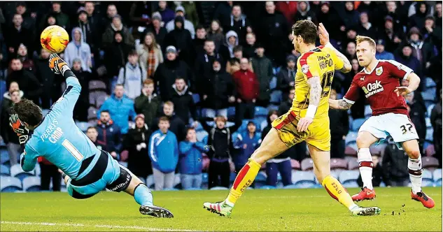  ?? PICTURES: Action Images ?? THAT’S TWO: Scott Arfield scores Burnley’s second goal