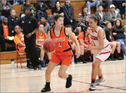  ?? Photo courtesy of Jennifer Kendall ?? Marysville’s Lysette Gonzalez (4) is guarded by Lindhurst’s Jadelyn English (3) during a basketball game in Olivehurst in February, 2020.