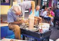  ?? COURTESY OF THE SILVER CITY CLAY FESTIVAL ?? Learning to throw clay on a pottery wheel is a popular feature.