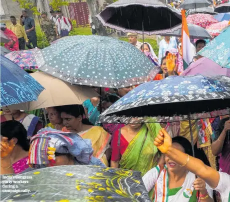  ?? ?? India’s Congress party workers during a campaign rally.