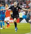  ?? Darko Bandic ?? The Associated Press Croatia forward Andrej Kramaric celebrates his side’s opening goal against Russia in a World Cup quarterfin­al match Saturday in Sochi, Russia. Croatia won on penalty kicks.