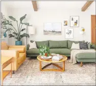  ?? PHOTO COURTESY STATEPOINT ?? Cozy textures and a palette of mellow coral, subtle orange, soft green and creamy shades of white and brown can be used to achieve this look in spaces like bedrooms or family rooms.