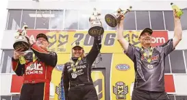  ?? Thomas B. Shea ?? For the fifth consecutiv­e NHRA event, the top winners included a woman, as Courtney Force joined Doug Kalitta, left, and Greg Anderson on the podium.