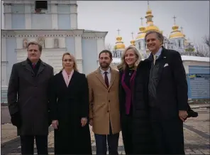  ?? (AP/Vasilisa Stepanenko) ?? Chairman of the House Permanent Select Committee on Intelligen­ce Rep. Mike Turner, R-Ohio (from left), U.S. Ambassador to Ukraine Bridget Brink, Rep. Jason Crow, D-Colo., Rep. Abigail Spanberger, D-Va. and Rep. French Hill, R-Ark. pose for a photo near St. Michael Monastery in Kyiv, Ukraine, on Friday.