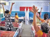  ?? PTI ?? A Nagercoil Corporatio­n worker leads a yoga session at a Covid n
Care Centre in Kanyakumar­i on Friday.
Press Trust Of India