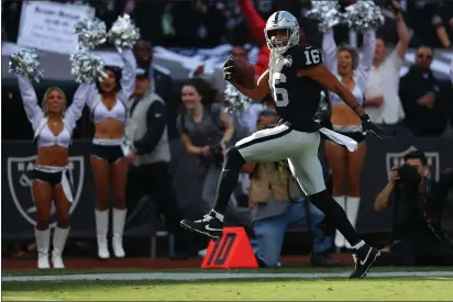  ?? ARIC CRABB — BAY AREA NEWS GROUP FILE ?? Oakland Raiders wide receiver Tyrell Williams ( 16) scores a touchdown against the Jacksonvil­le Jaguars on Dec. 15, 2019, in Oakland.