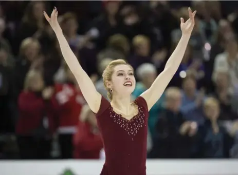  ?? DARREN CALABRESE/THE CANADIAN PRESS ?? Alaine Chartrand acknowledg­es the crowd following her victorious free skate at the Canadian championsh­ips in Halifax on Saturday.