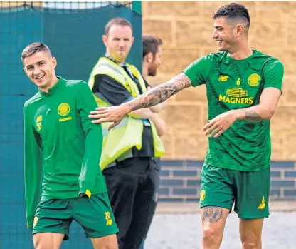  ?? Picture: SNS Group. ?? Marian Shved shares a joke with Nir Bitton at training.