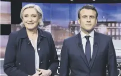  ??  ?? 0 Marine Le Pen and Emmanuel Macron before the final debate