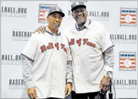  ?? JOHN LOCHER/PILOTONLIN­E.COM ?? Former White Sox outfielder Harold Baines and ex-Cubs closer Lee Smith pose during a news conference for the Baseball Hall of Fame last December.