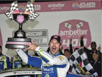  ?? AP ?? Daniel Suarez holds trophy after winning the NASCAR auto race at Atlanta Motor Speedway on Feb. 25 in Hampton, Ga. Chevrolet has now won at least one race in the NASCAR national ranks every weekend since The Roval last October.