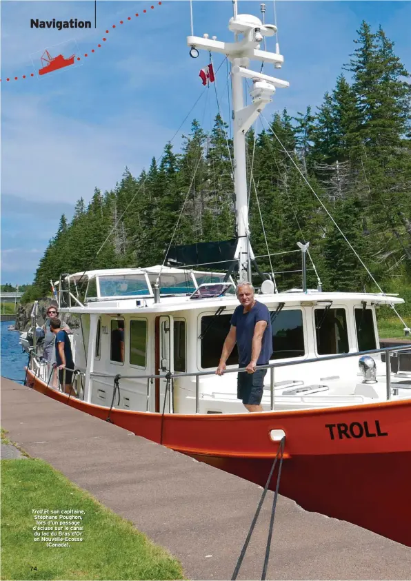  ??  ?? Troll et son capitaine, Stéphane Poughon, lors d’un passage d’écluse sur le canal du lac du Bras d’Or en Nouvelle-Ecosse (Canada). 74