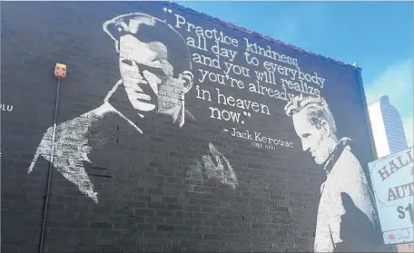  ?? Photograph­s by David Kelly For The Times ?? A MURAL along Colfax Avenue in Denver illustrate­s a quote by Jack Kerouac, who shaped the Beat generation during his time in the area.