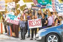  ?? HAYNE PALMOUR IV U-T ?? People protest ending DACA on Via Rancho Parkway in front the Westfield North County shopping mall.
