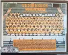  ?? SUBMITTED ?? Former Tennessee offensive lineman Phil Stuart keeps a $5 he won in a bet with Johnny Majors with his team photo of the 1985 squad, dubbed the Sugar Vols after a season that culminated with a win over Miami in the Sugar Bowl.