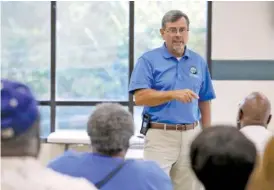  ?? STAFF PHOTO BY ERIN O. SMITH ?? District 1 Councilman Chip Henderson answers questions about shortterm vacation rentals during Monday’s community meeting at Eastdale Youth and Family Developmen­t Center.