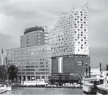  ?? RICK STEVES ?? The burgeoning HafenCity district and its spectacula­r new Elbphilhar­monie concert hall are revitalizi­ng Hamburg’s riverfront.