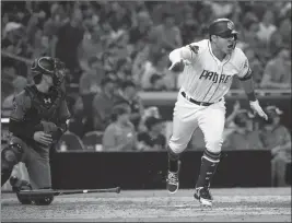  ?? ASSOCIATED PRESS ?? SAN DIEGO PADRES’ CHRISTIAN VILLANUEVA heads to first with a walk-off single against the Arizona Diamondbac­ks during Saturday’s game in San Diego. The Padres won 7-6.