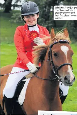  ??  ?? Winner Showjumper Erin Shaw on Charm proudly showing off their first place novice rosette