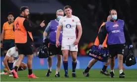  ?? Australia. Photograph: Laurence Griffiths/Getty Images ?? Owen Farrell leaves the pitch after injuring his ankle during England’s 32-15 win against